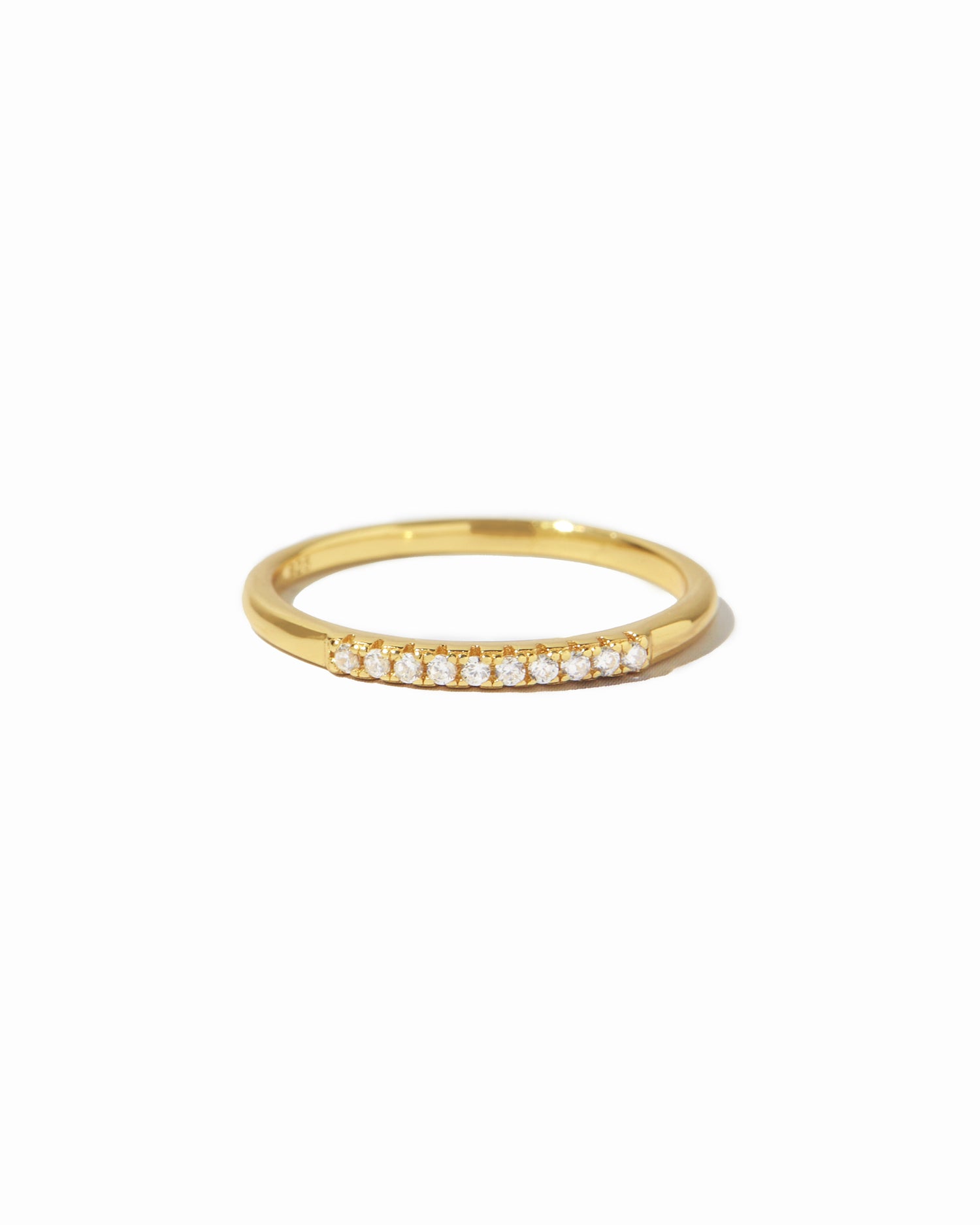 Dainty gold pave diamond stacking ring.