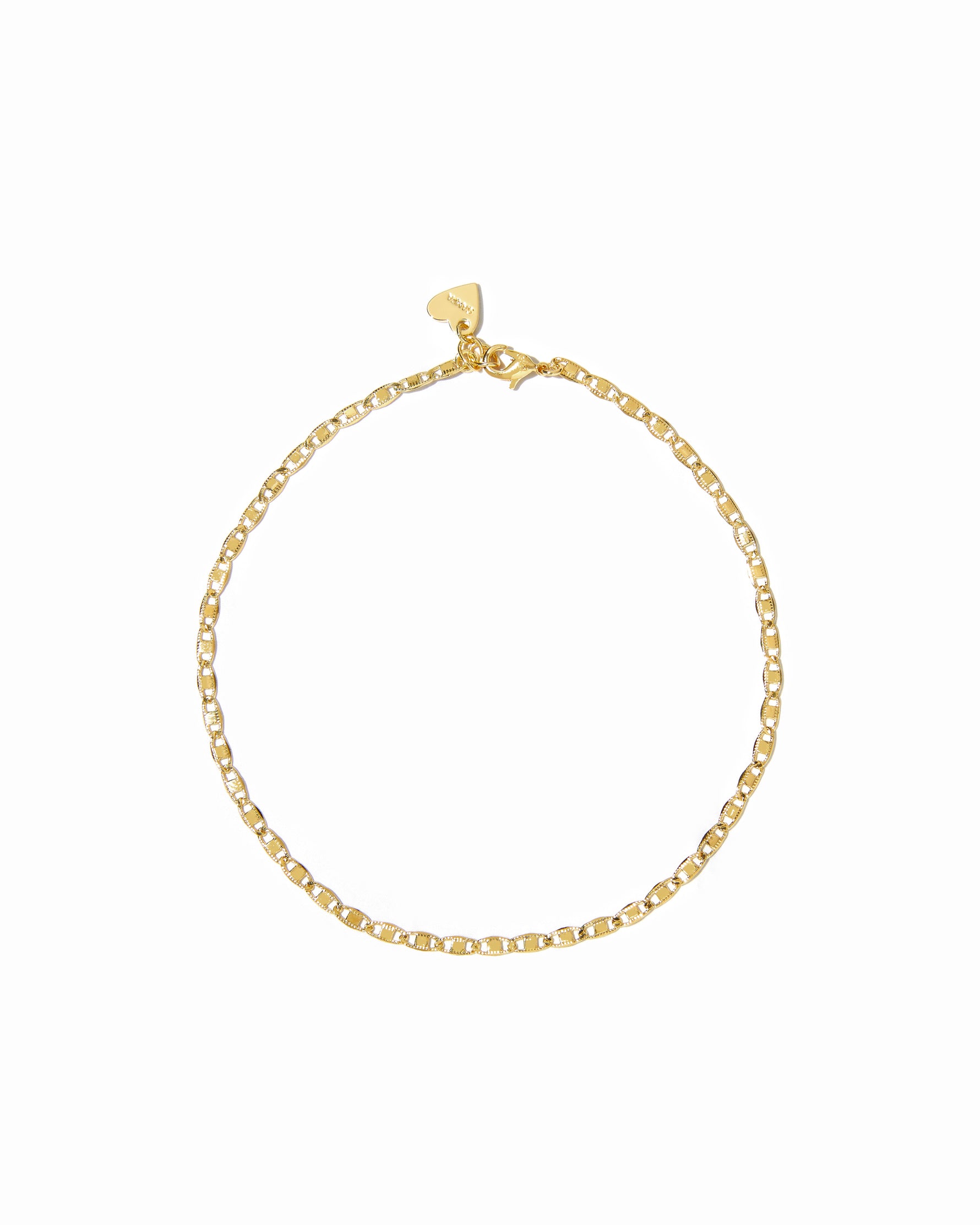 Gold chain anklet on white background