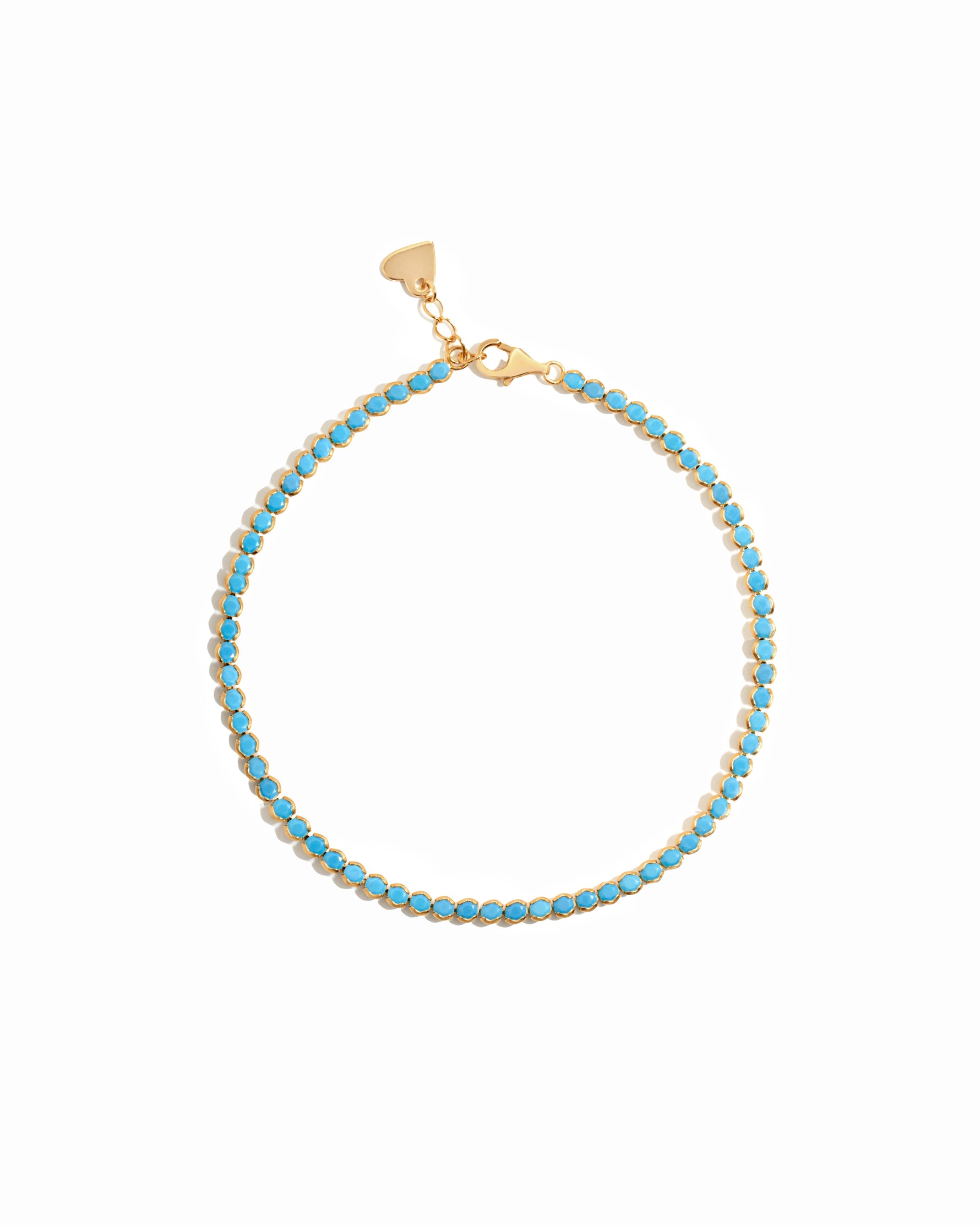 Gold turquoise round tennis anklet on white background
