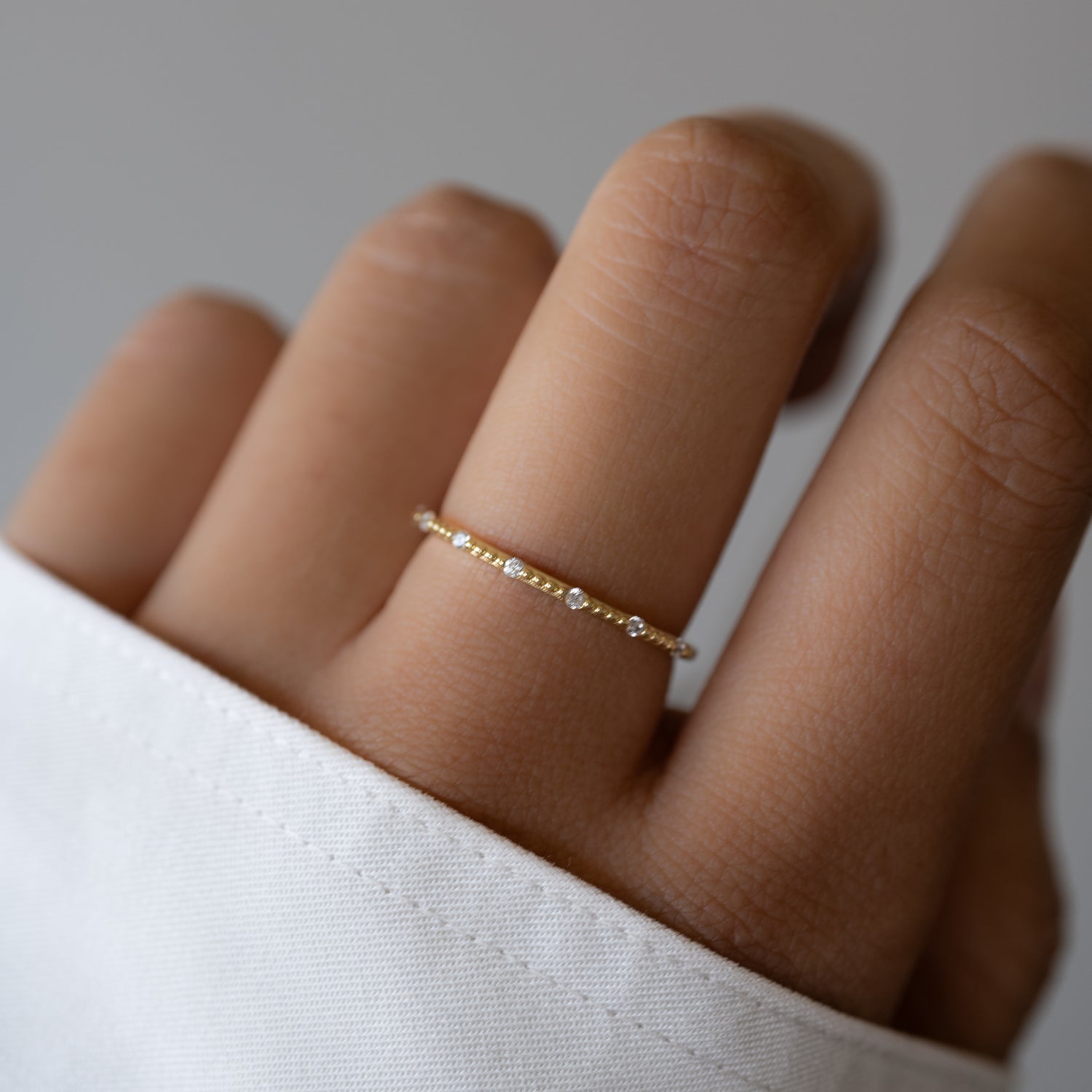 Dainty stacking ring on model