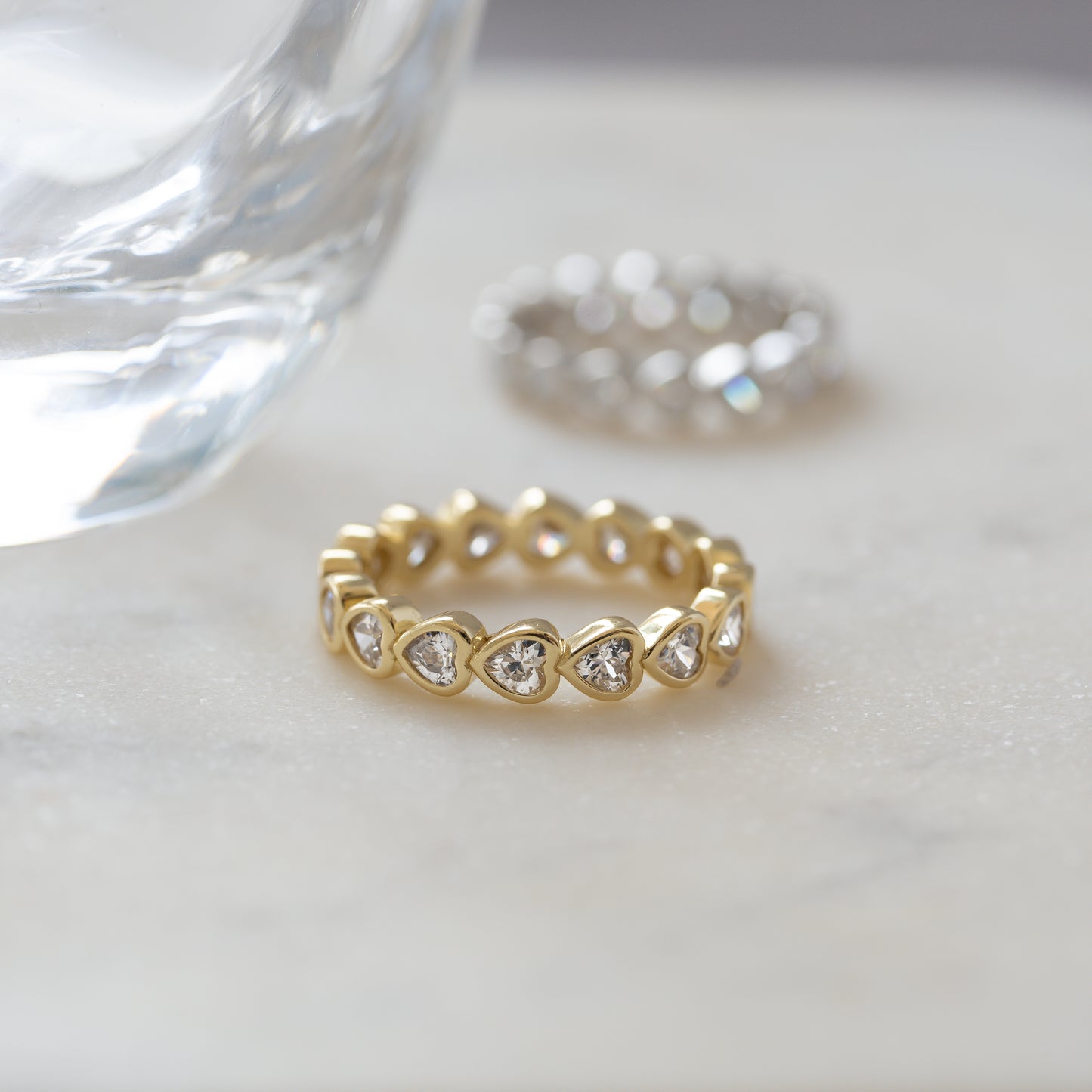 dainty gold heart shaped eternity ring