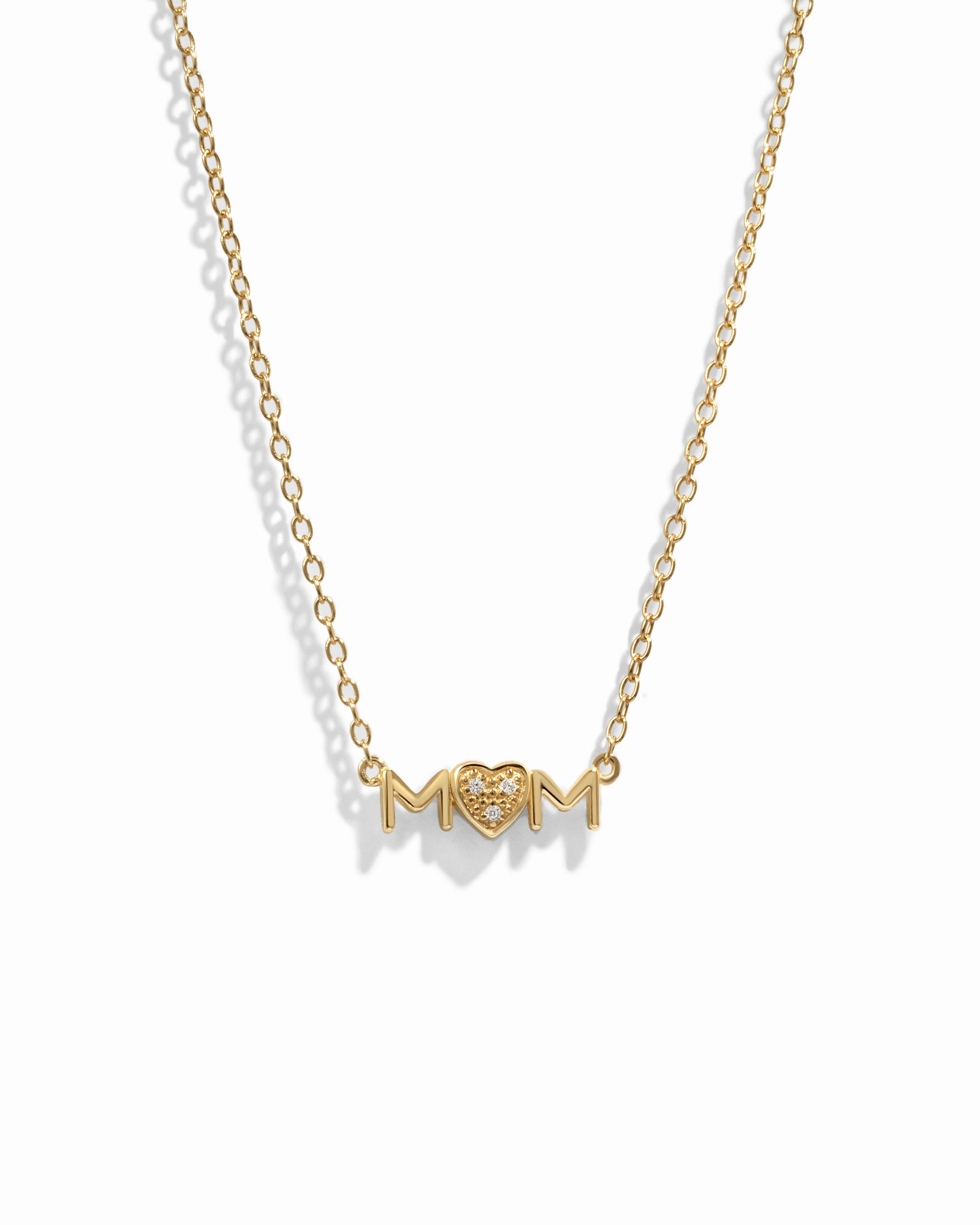 Closeup image of gold heart necklace for her