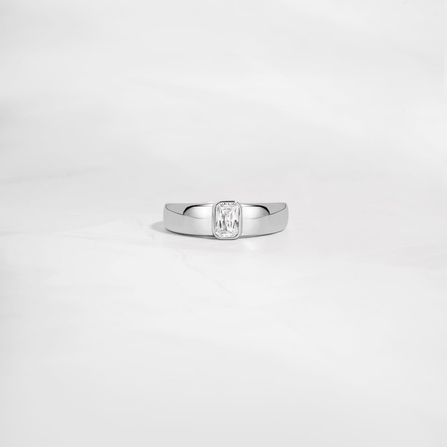 dome ring featuring silver baguette stone