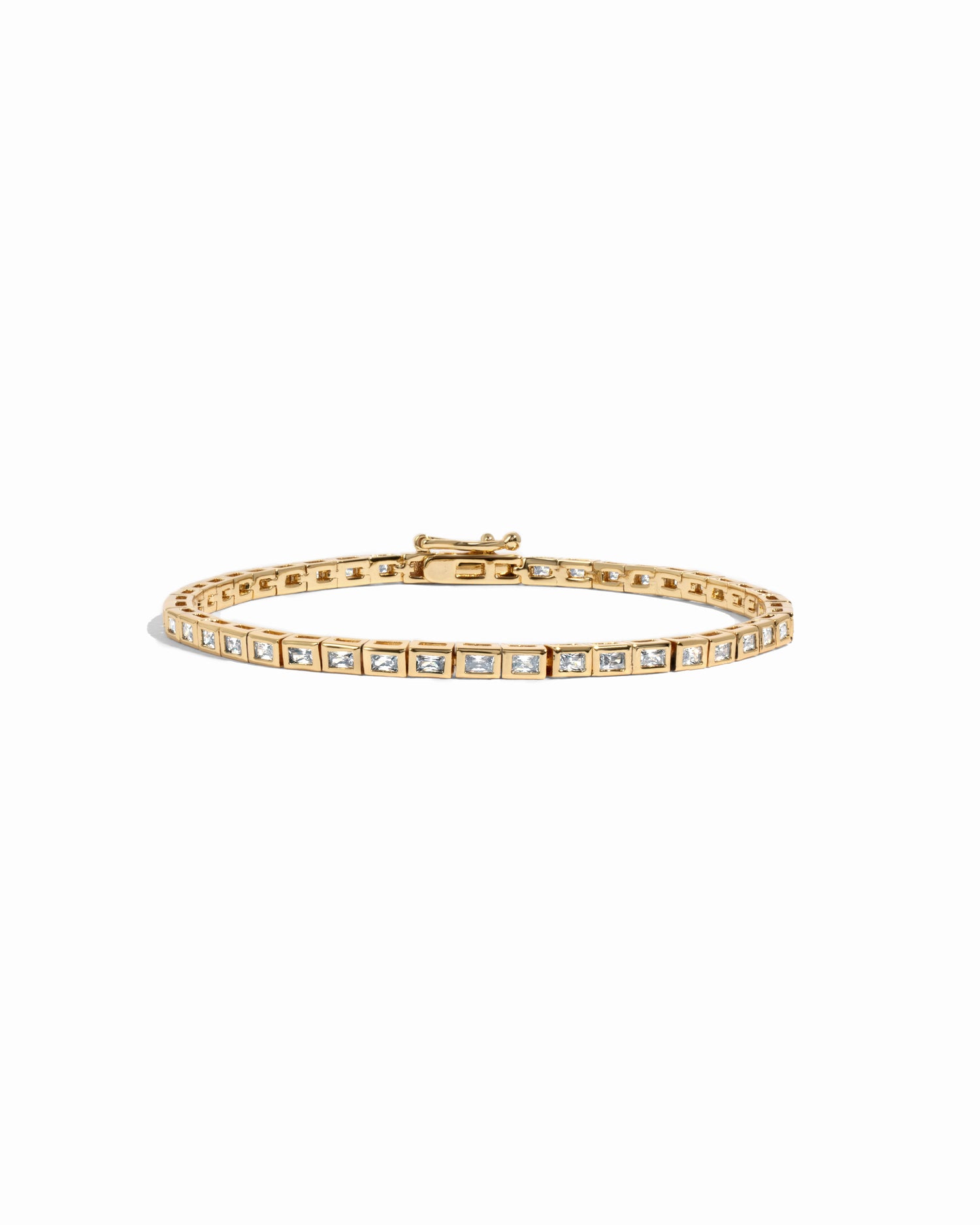 gold dainty baguette bracelet with bezel set stones