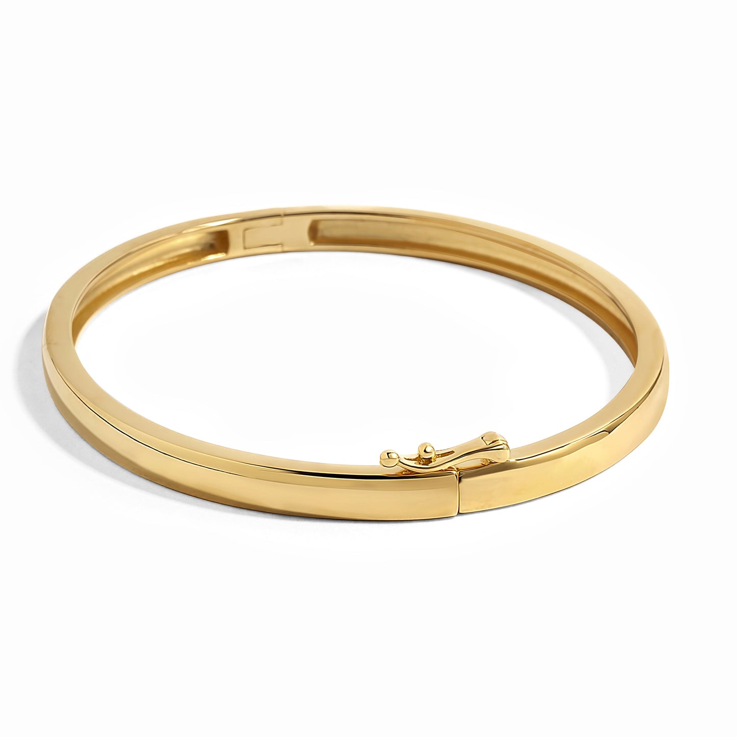image showing a gold bangle bracelet and its latch clasp