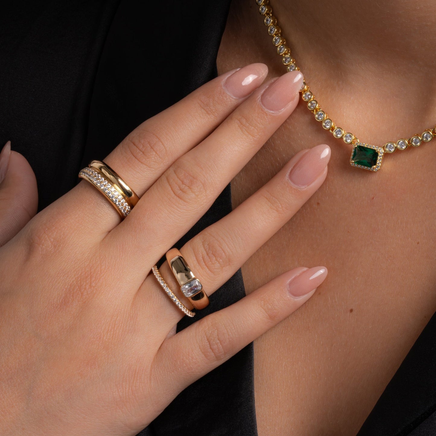 model wearing chunky jewelry featuring gold chunky ring