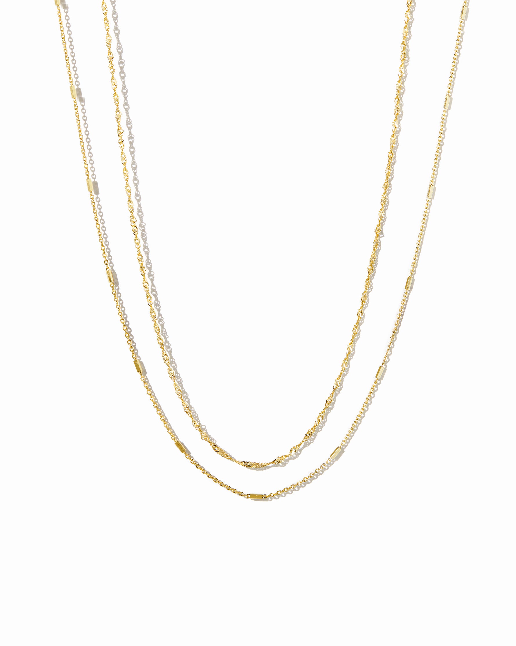 dainty layering necklace set in gold
