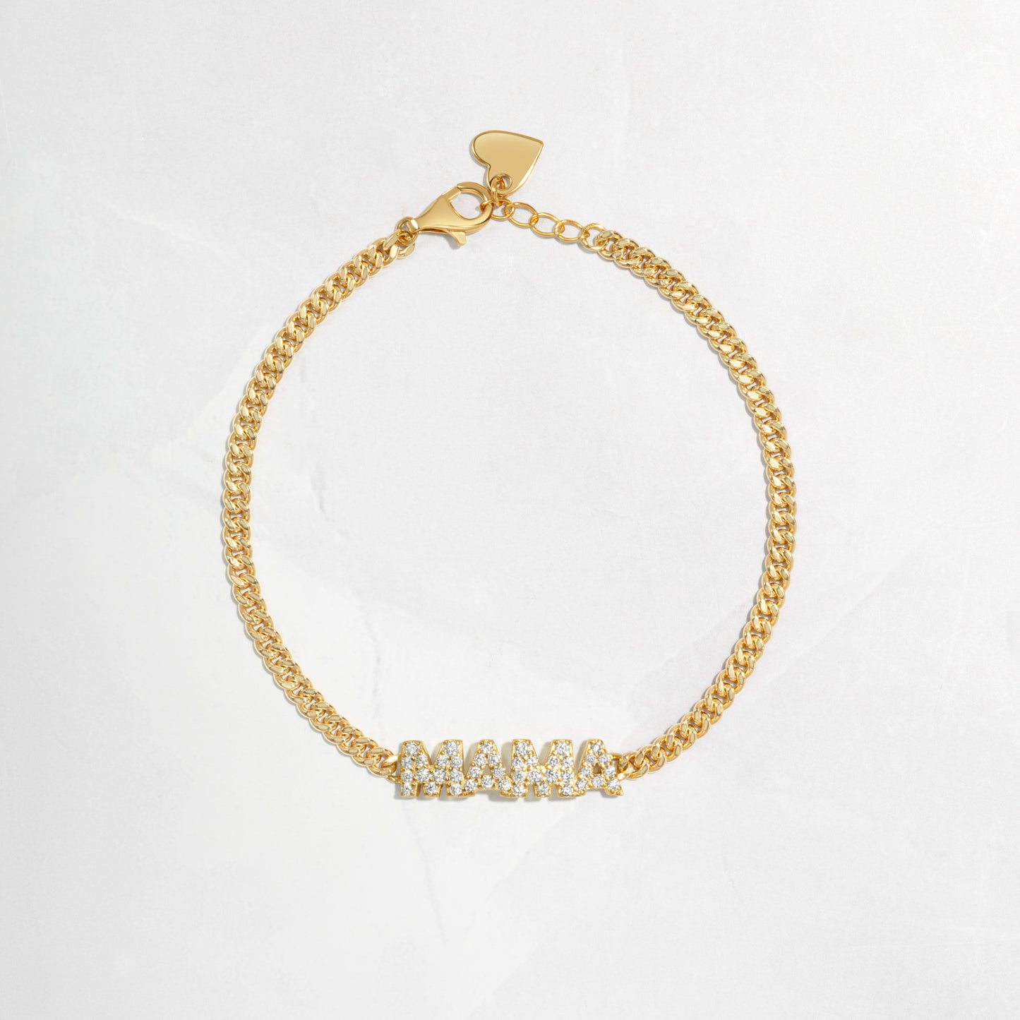 Closeup image of MAMA chain bracelet in gold