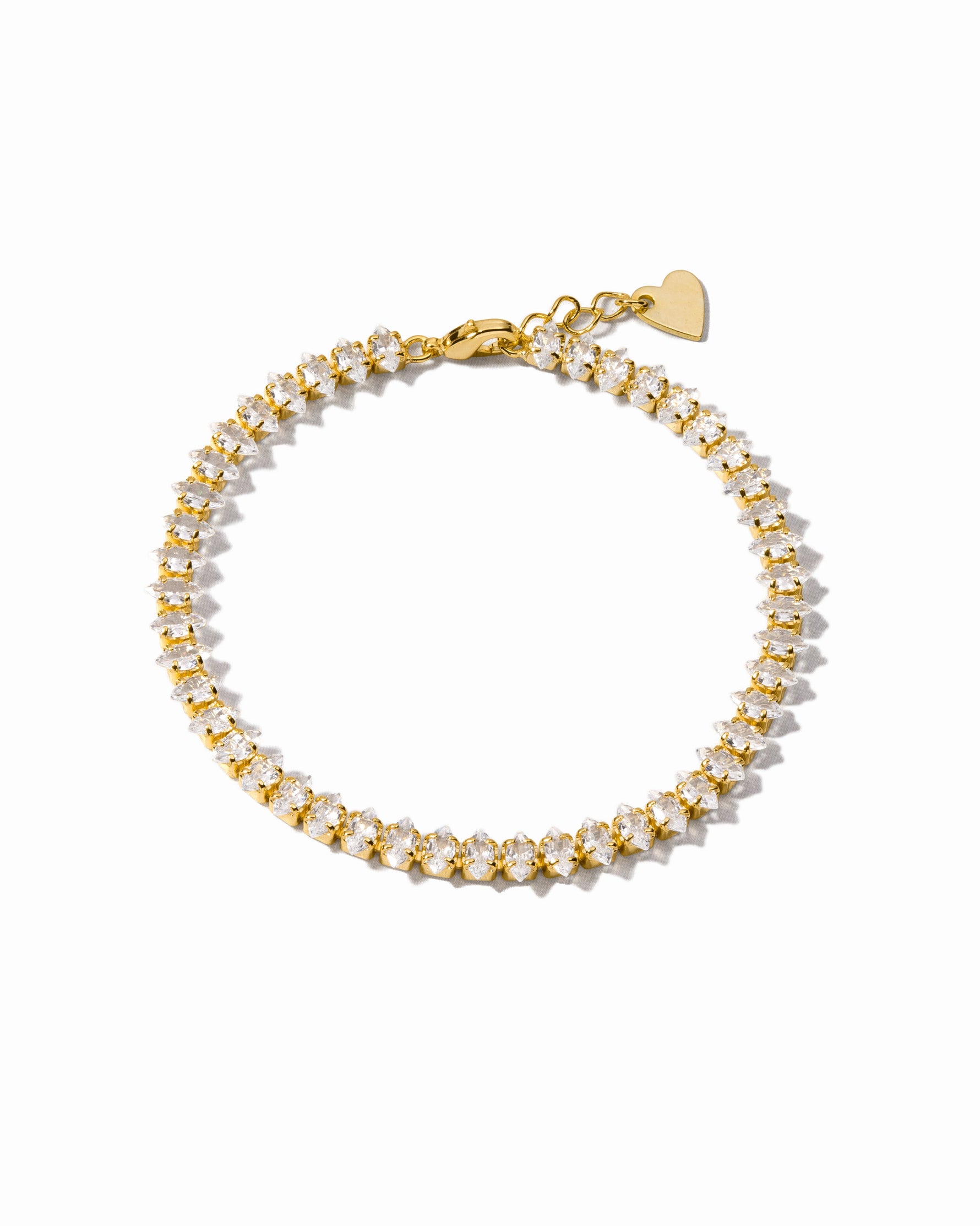 Gold marquise-cut tennis bracelet on a white background