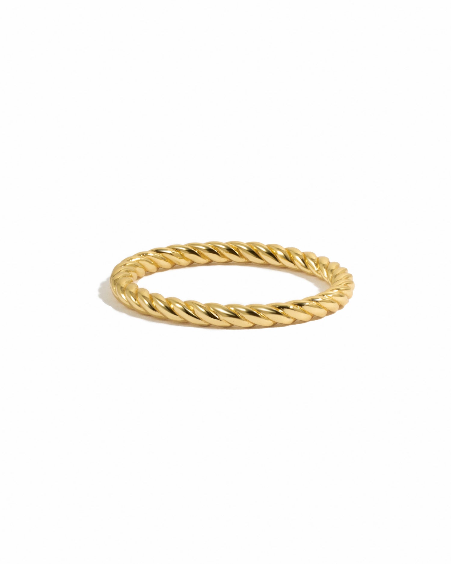 closeup image of gold twisted spiral ring
