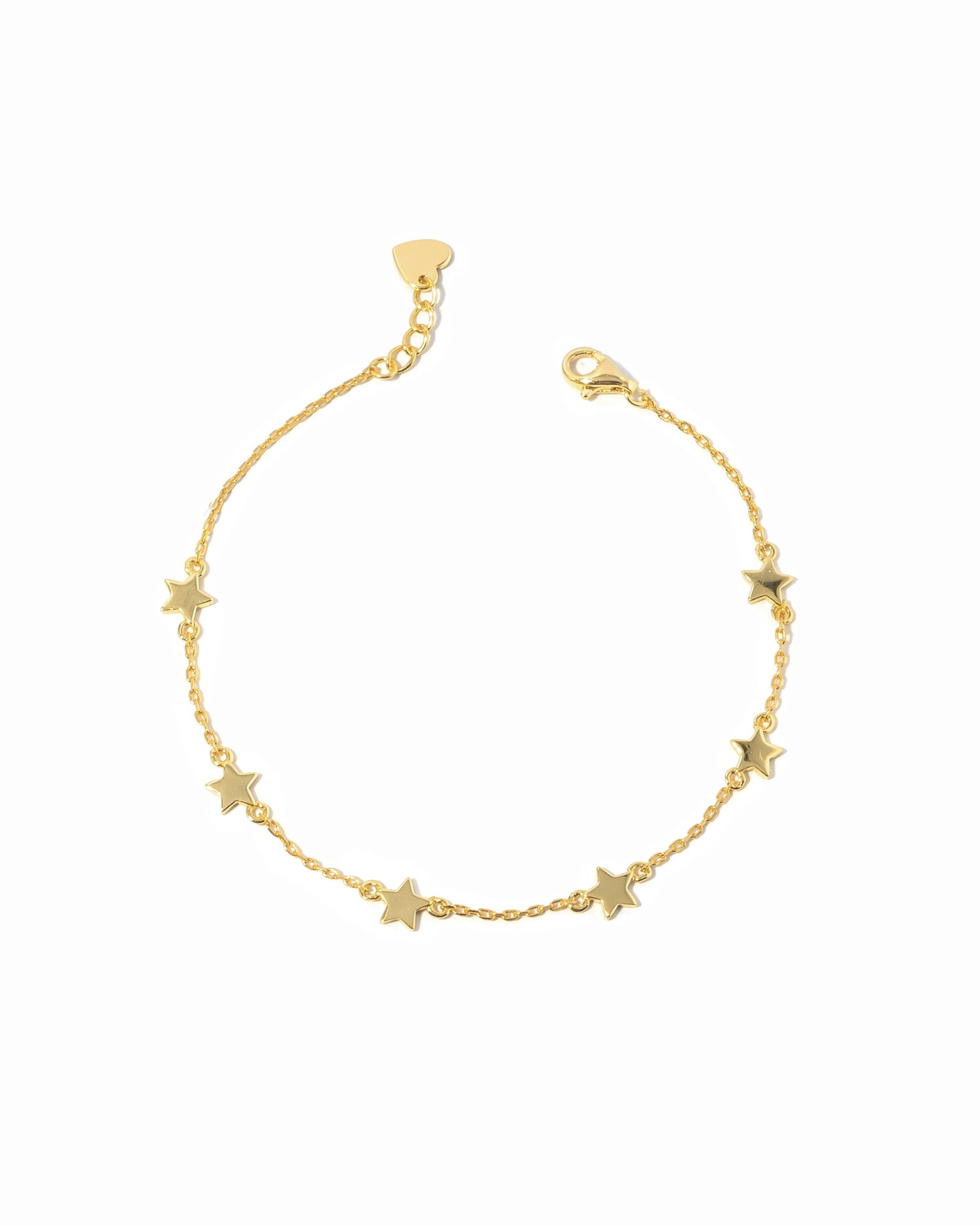 Star charm ankle bracelet on a white background