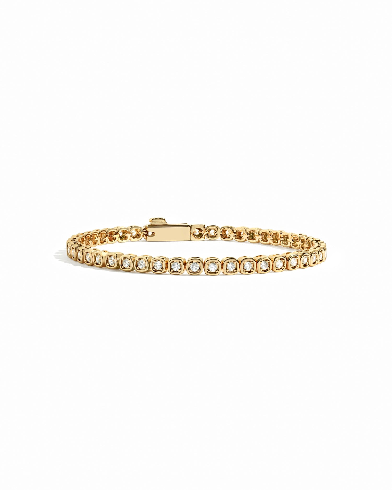 Gold square tennis bracelet on white background
