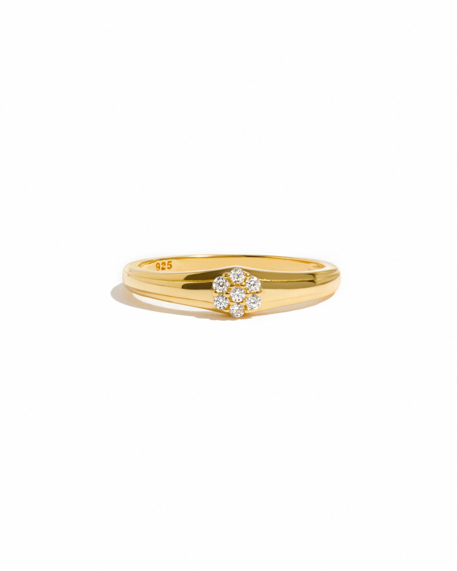 Gold vintage stacking ring on a white background