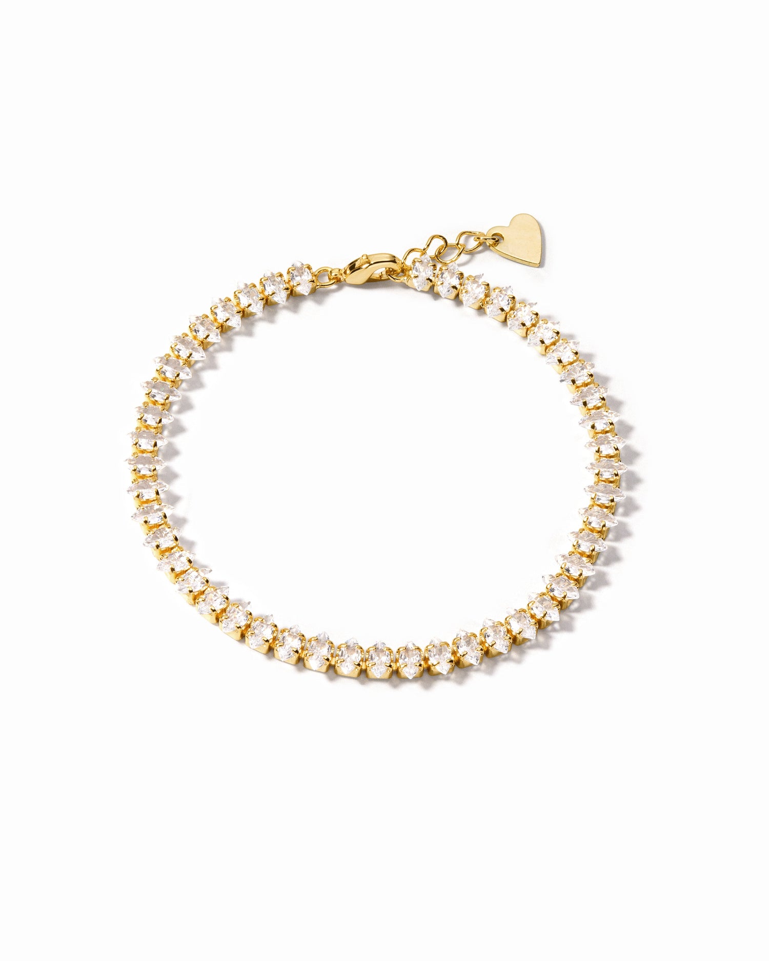 Gold marquise ankle bracelet on white background