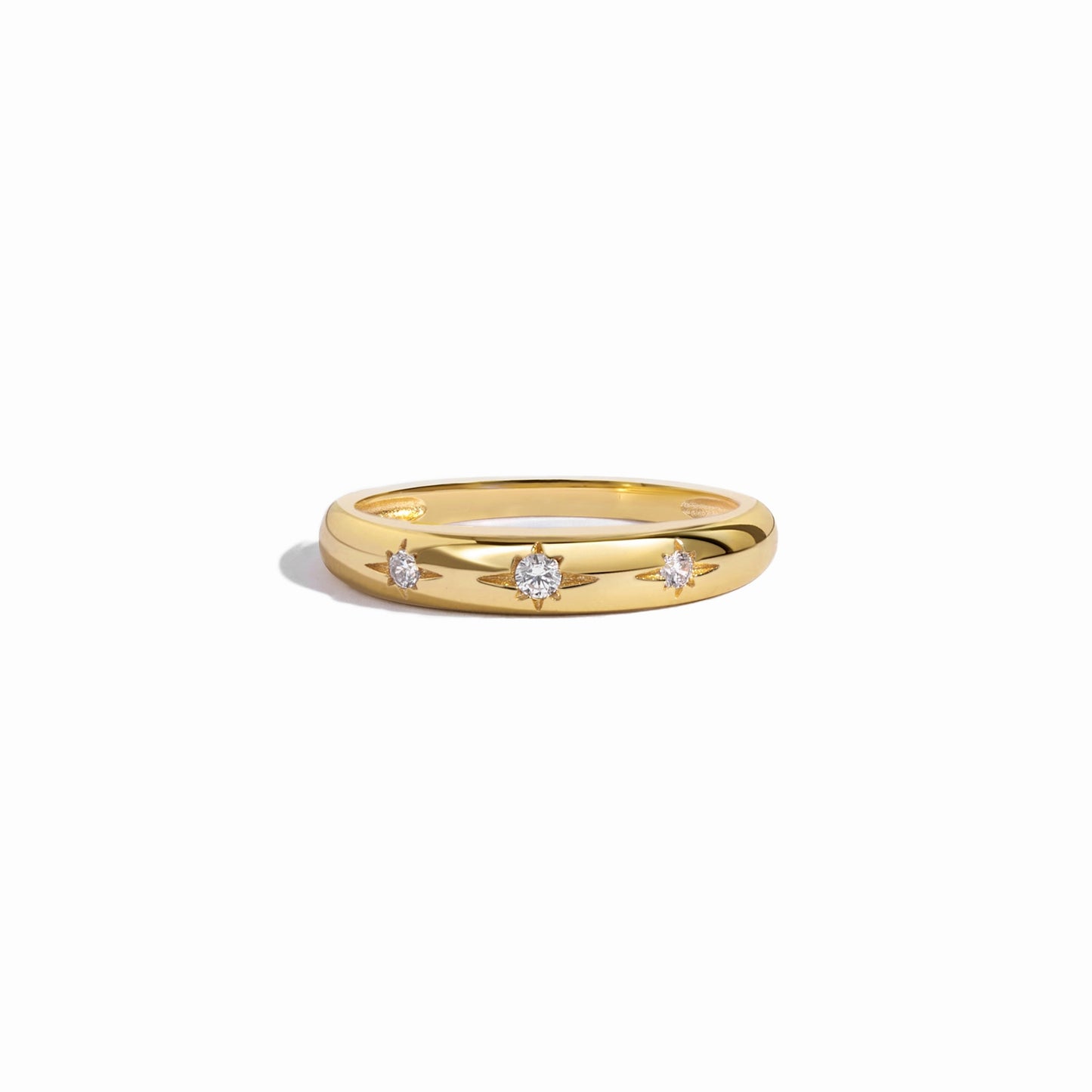Gold minimalist Diamond Ring with Star Setting on white background
