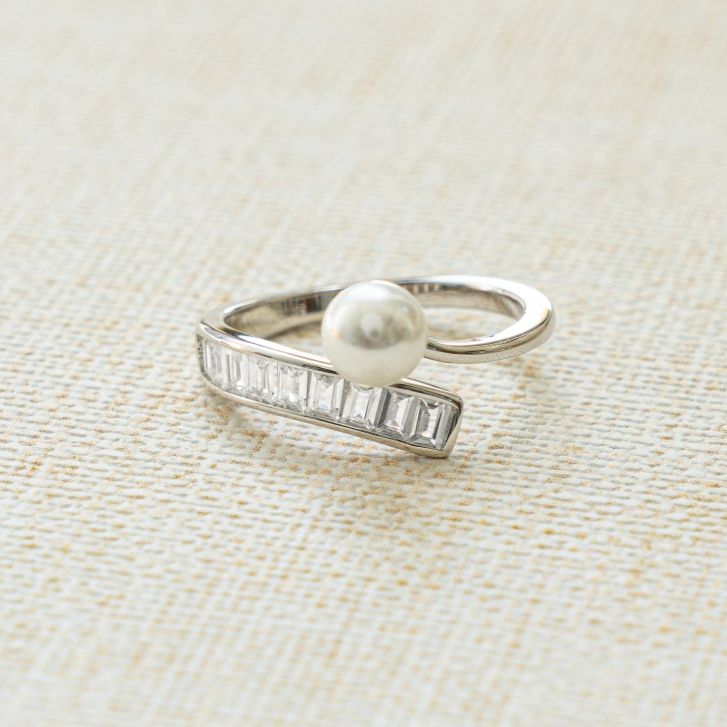 spiral pearl stacking ring with baguette ring design in sterling silver
