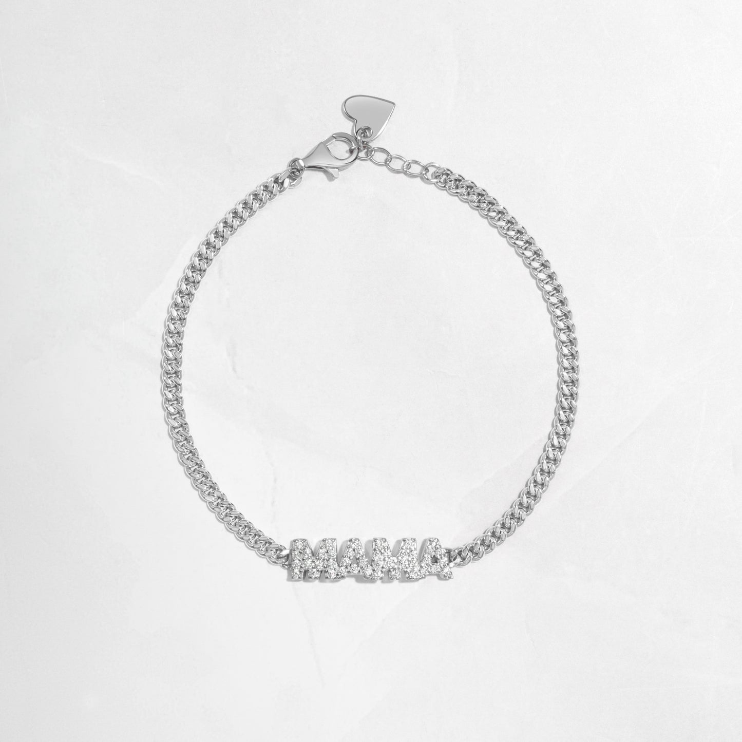Closeup image of silver chain with MAMA charm