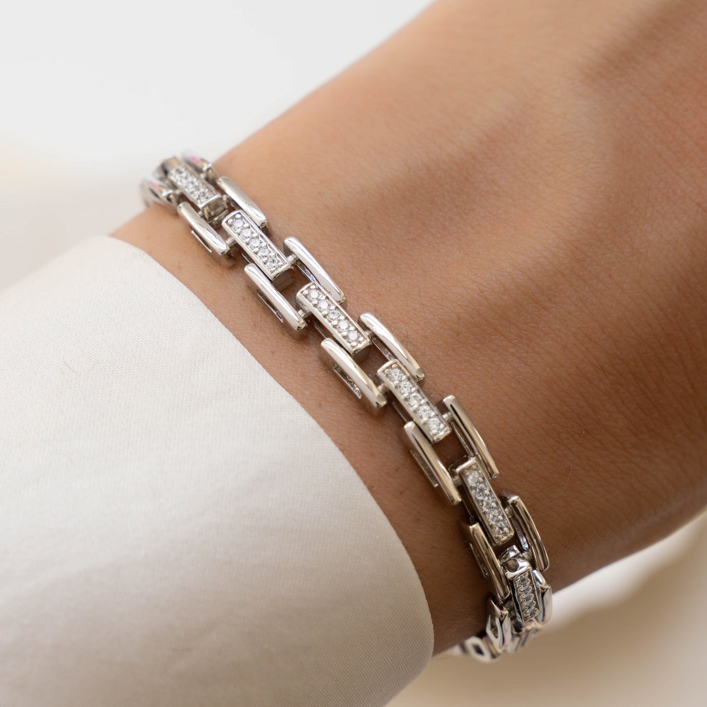 Model wearing silver chain vintage cz bracelet