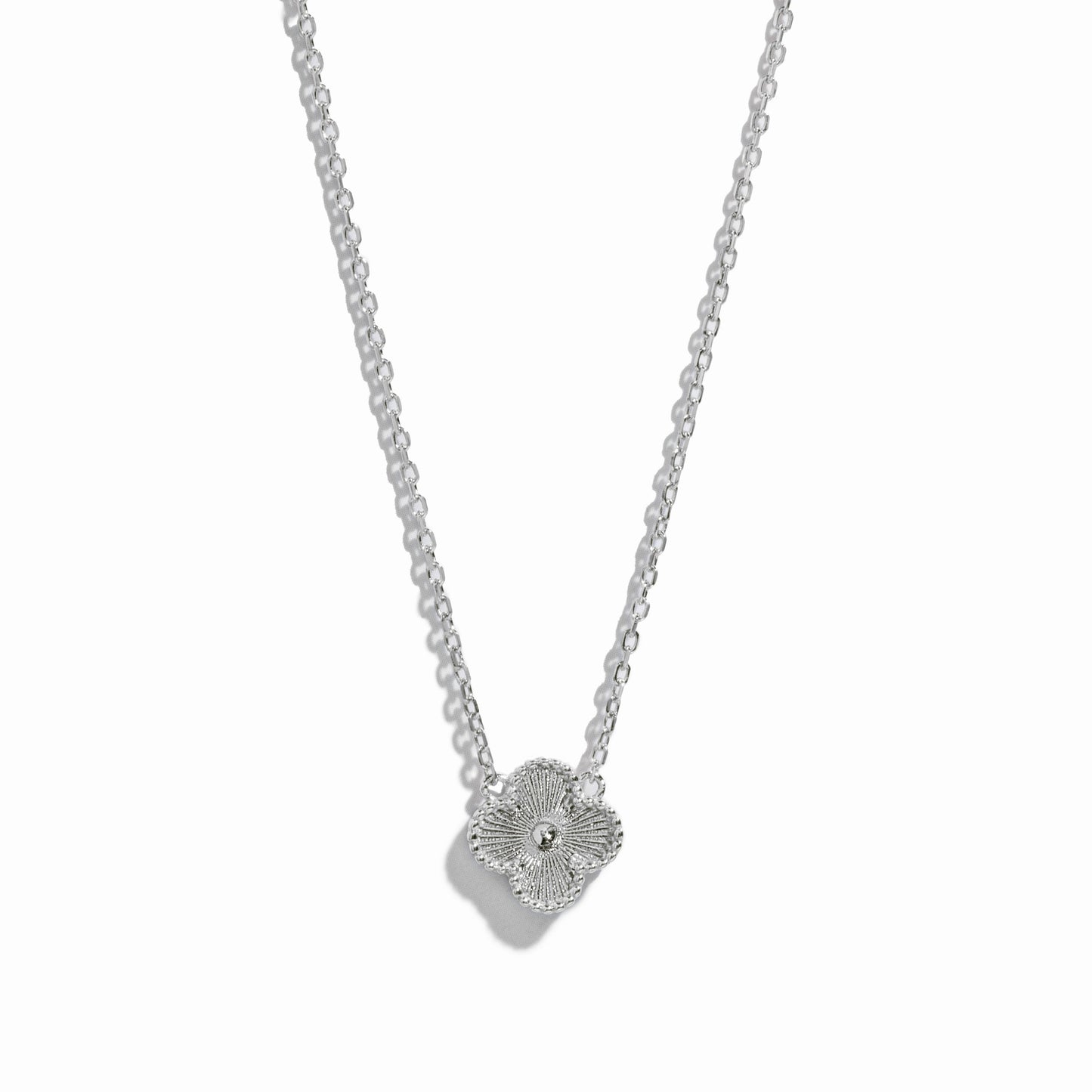 silver four leaf clover design necklace