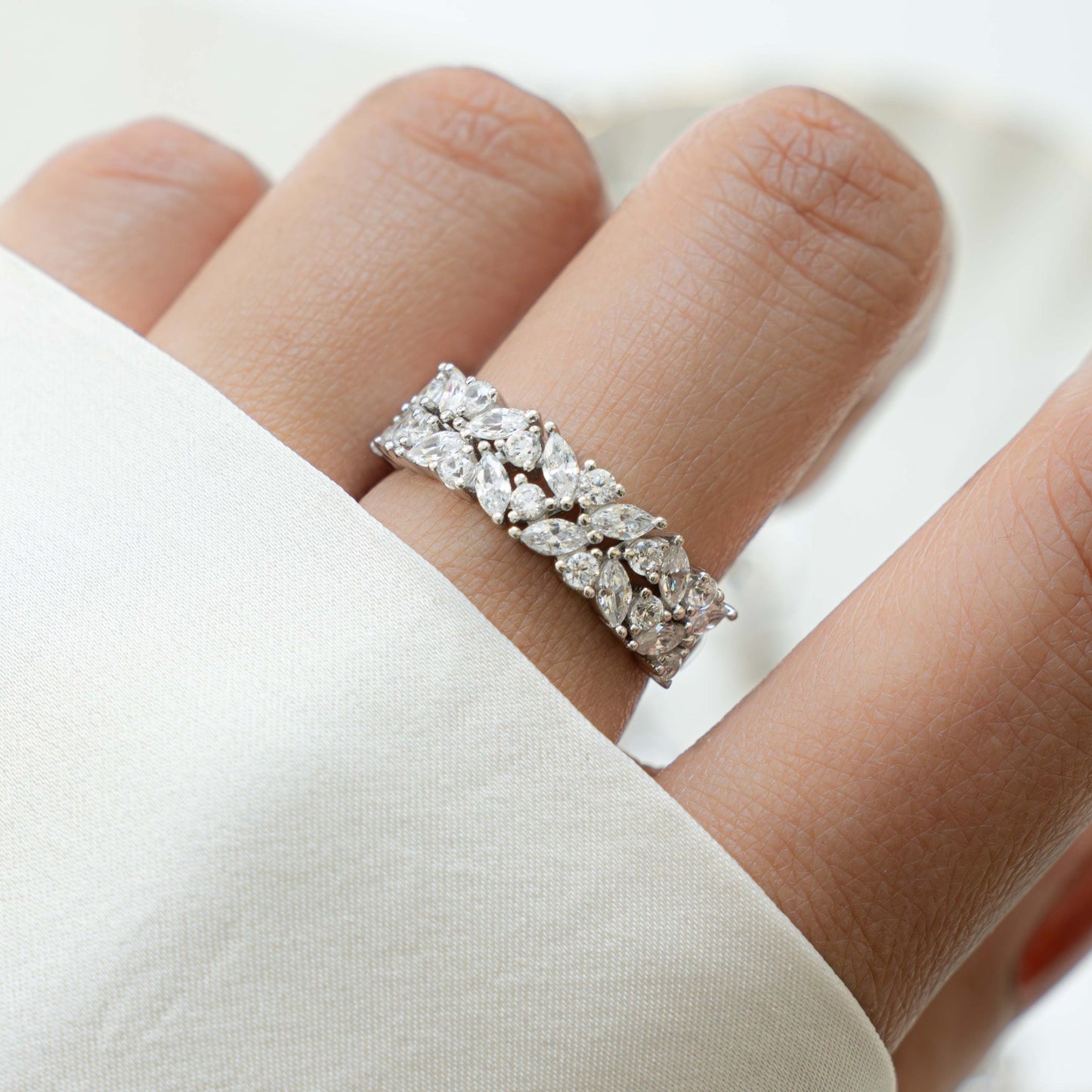 image wearing sterling silver double multi stone band ring