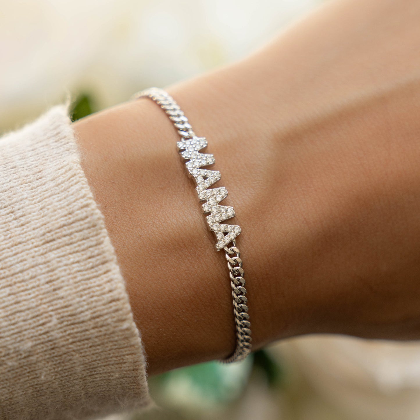 Model wearing MAMA silver chain diamond bracelet