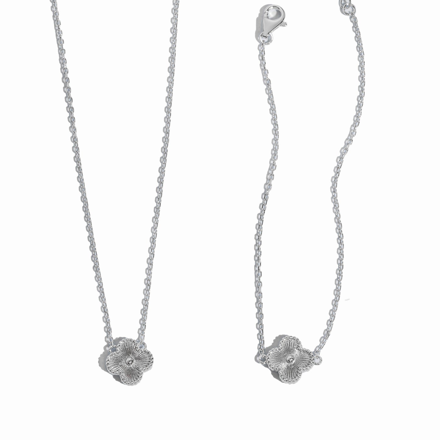 silver four leaf clover pendant necklace and matching pendant bracelet