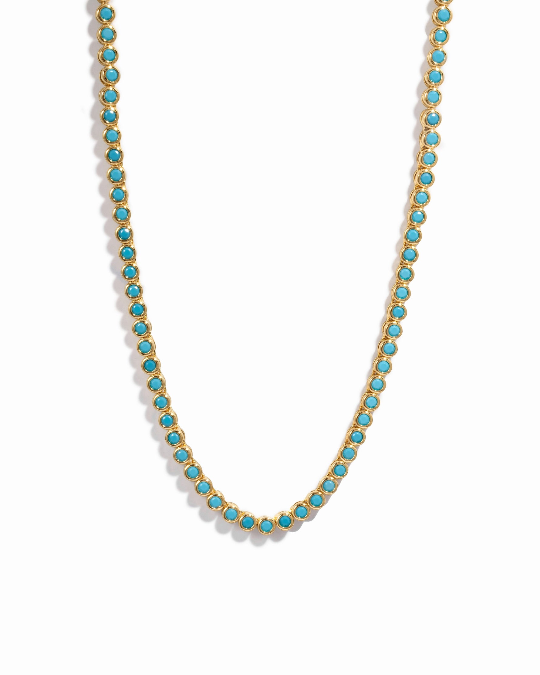 Turquoise beaded necklace on a white background