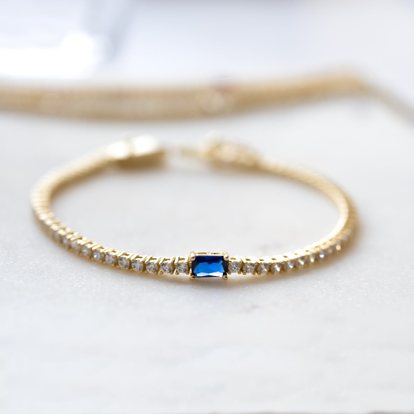 Tennis Bracelet with Sapphire Baguette Charm