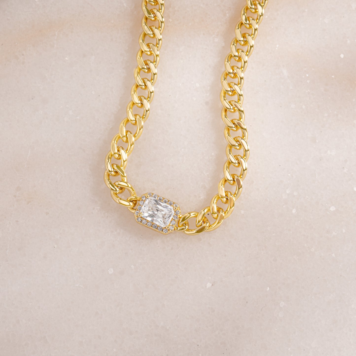 gold cuban link bracelet with diamond halo charm