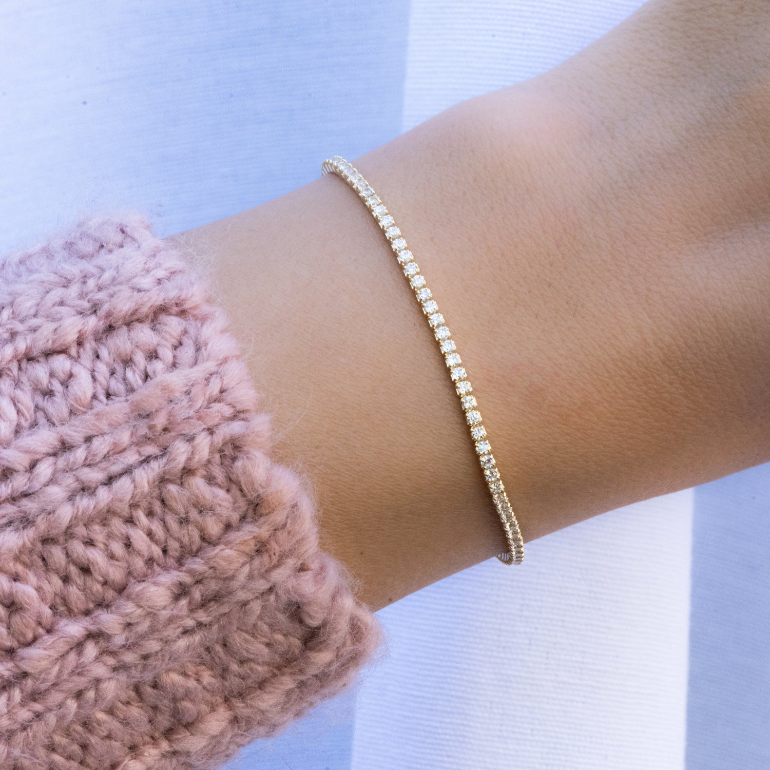 Close-up shot of the 1.75mm Tennis Bracelet on a model's wrist, displaying its brilliance and chic design.