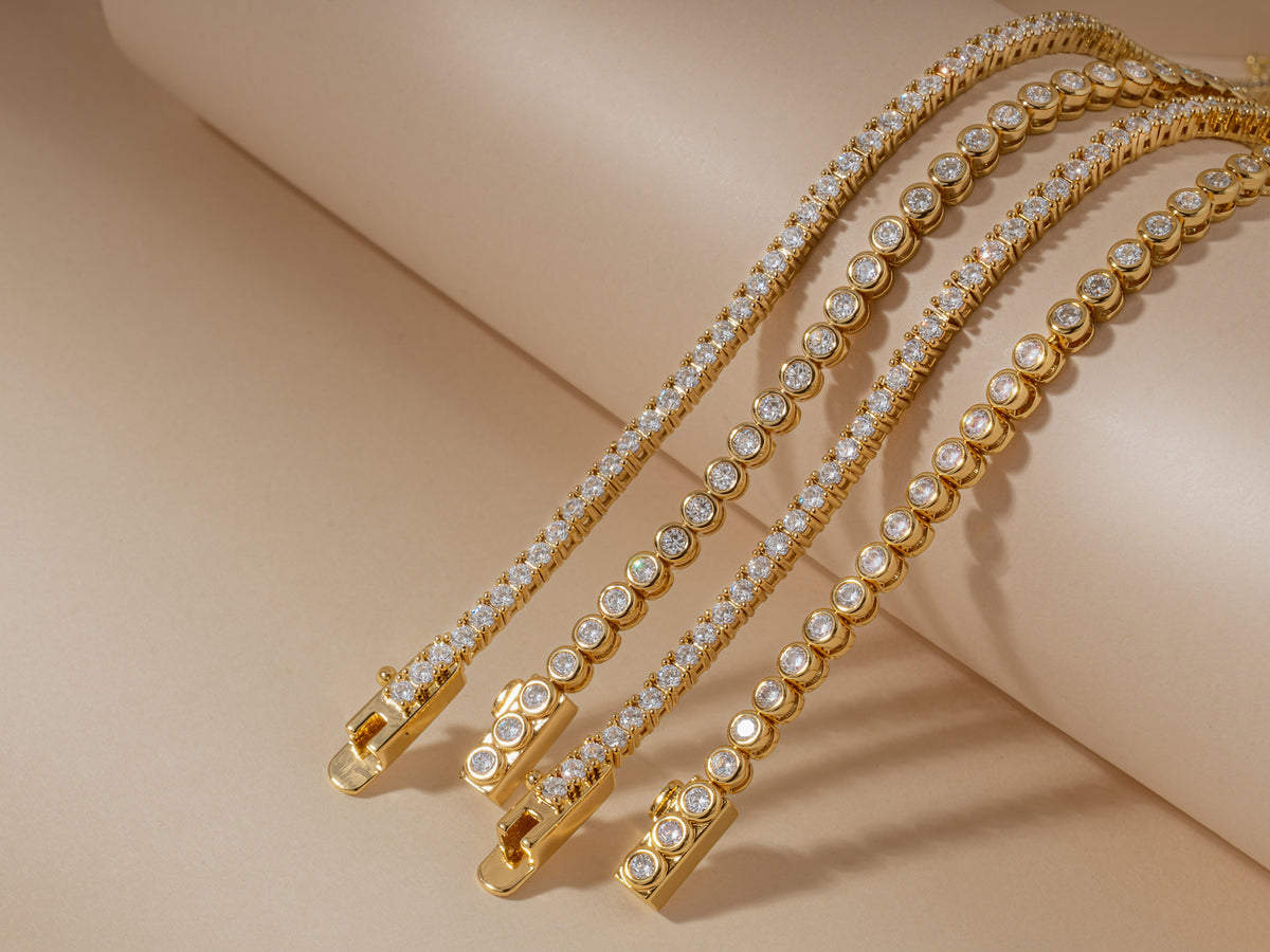 Four gold vermeil tennis bracelets from The Vermeil Edit