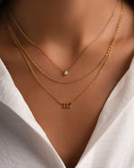 Gold angel number necklace by Sami Jewels featuring the number 111, stylish jewelry piece with a delicate chain.