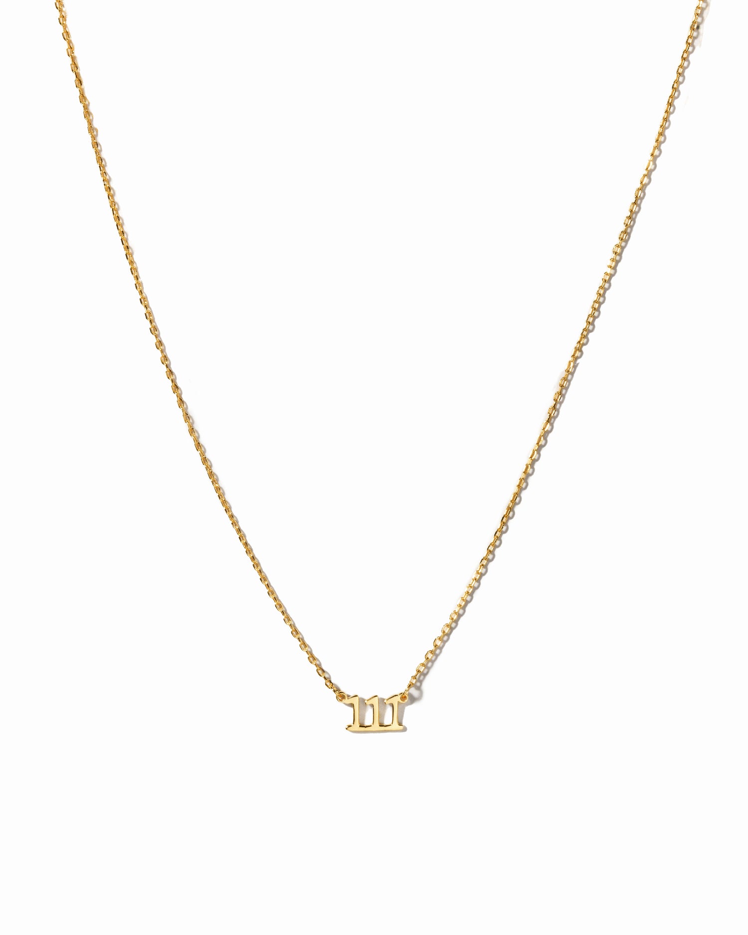Gold angel number necklace by Sami Jewels featuring a sleek design on a white background.