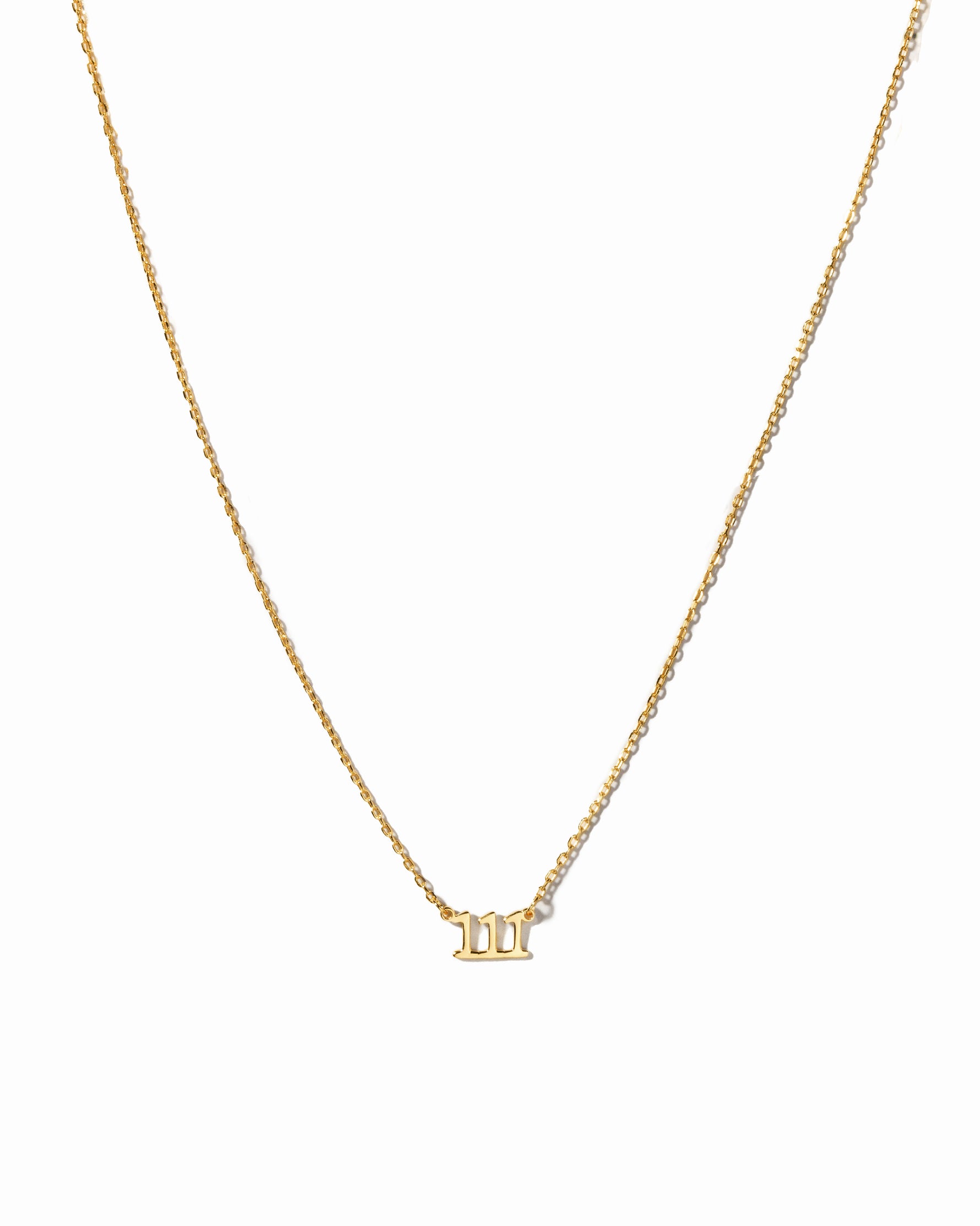 Gold angel number necklace by Sami Jewels featuring a sleek design on a white background.