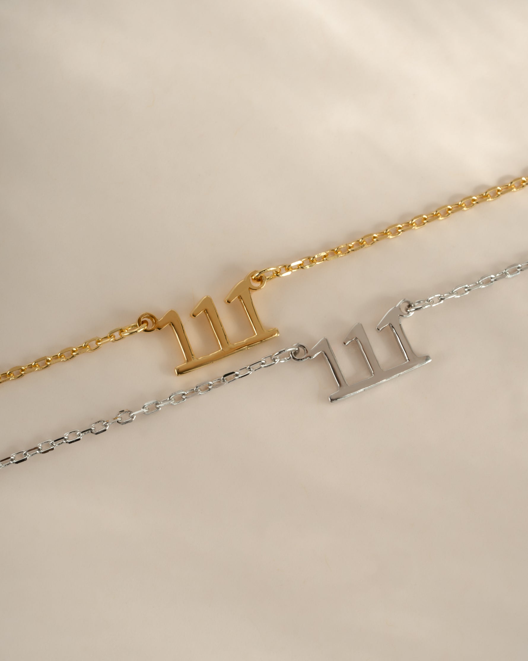 Sterling silver and gold angel number 111 necklace by Sami Jewels, featuring a delicate pendant with a modern design.
