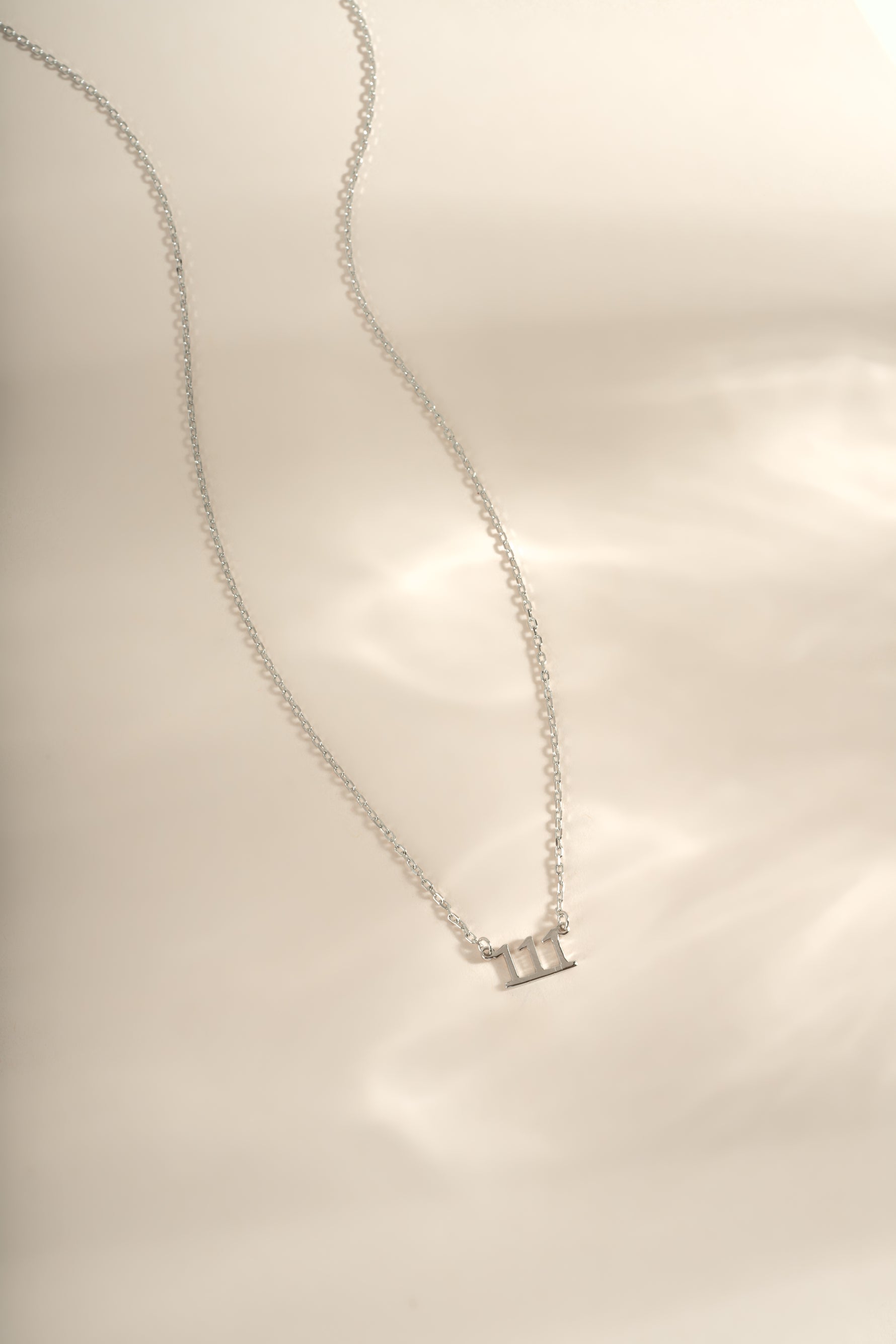 Sterling silver Angel Number Necklace from Sami Jewels featuring the number 111 design, stylish and perfect for everyday wear.