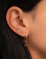 infinity hoop earrings in gold, 13mm, on models ear