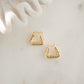 Chunky gold earrings with a unique triangle design