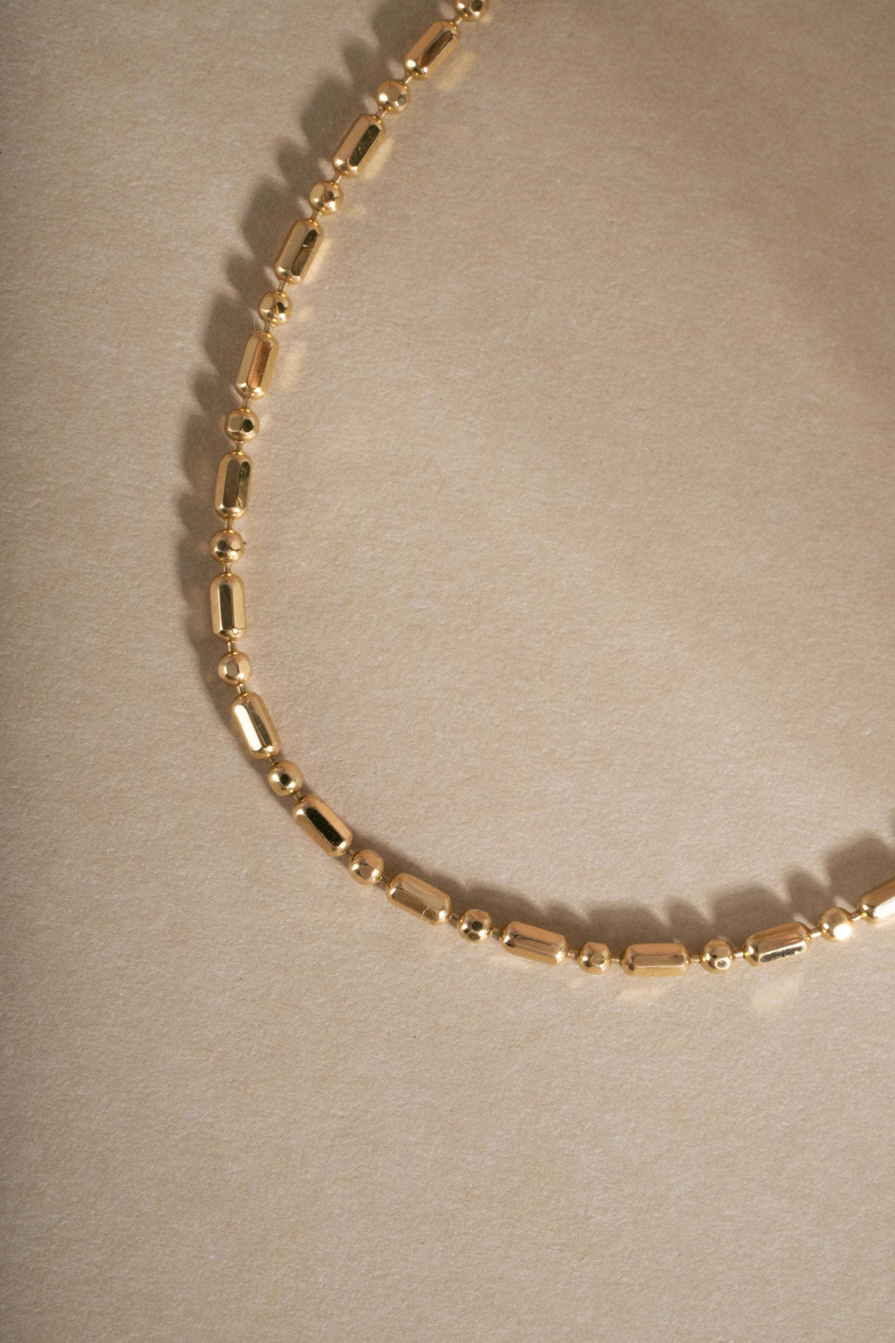 Detail of 14K solid gold bar station chain bracelet links