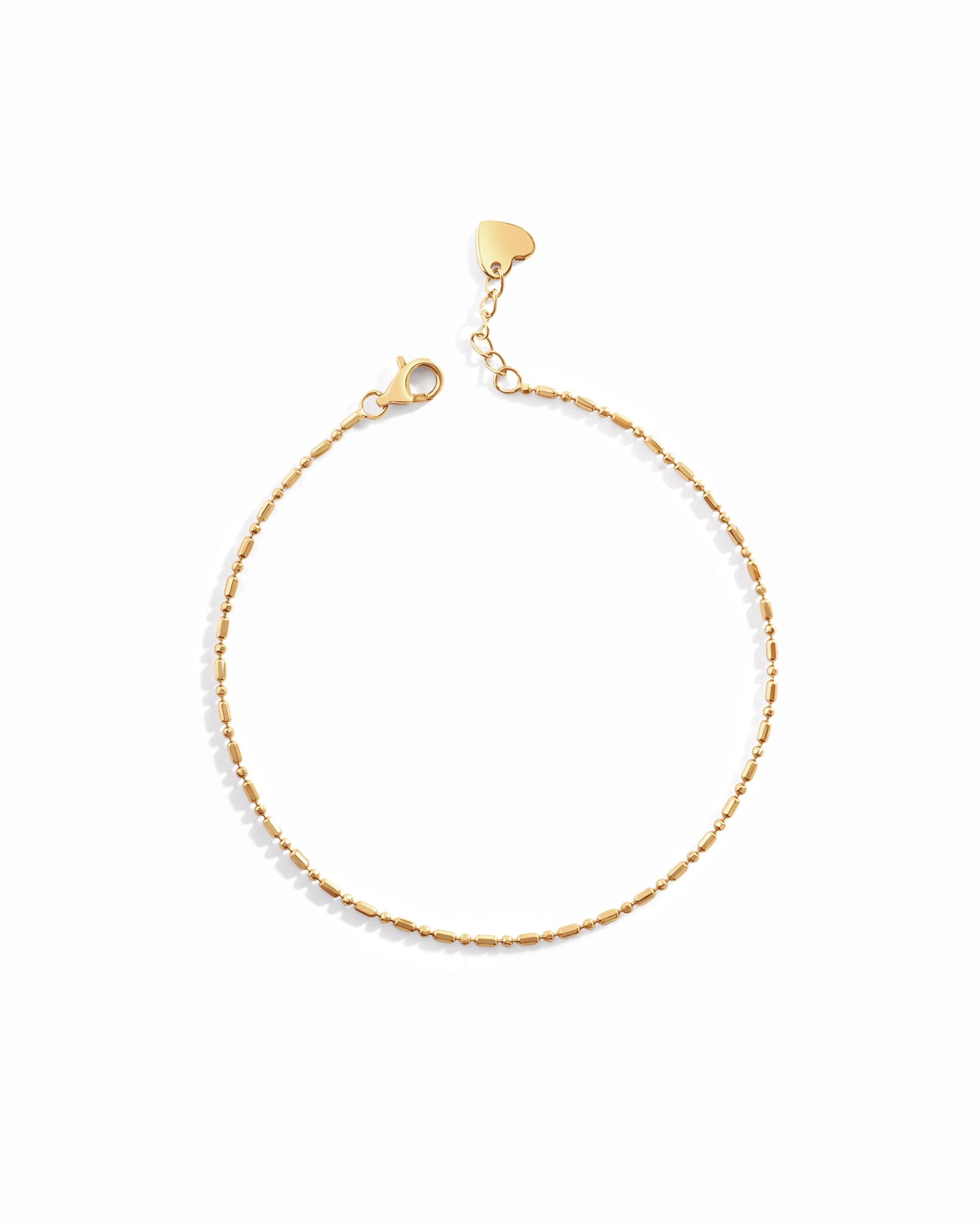 14K solid gold bar station chain bracelet showing elongated gold stations