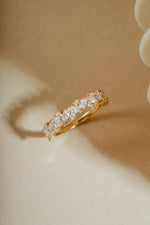 Multi stone ring angle with sparkling lab grown diamonds on neutral background