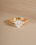 Minimalist round lab diamond ring crafted in solid 14k gold on beige background