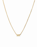 Gold angel number 222 necklace by Sami Jewels displayed on a white background, showcasing a delicate jewelry piece with number pendant.