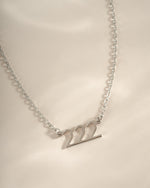 Sterling silver angel number 222 necklace by Sami Jewels featuring a delicate pendant on a chain.