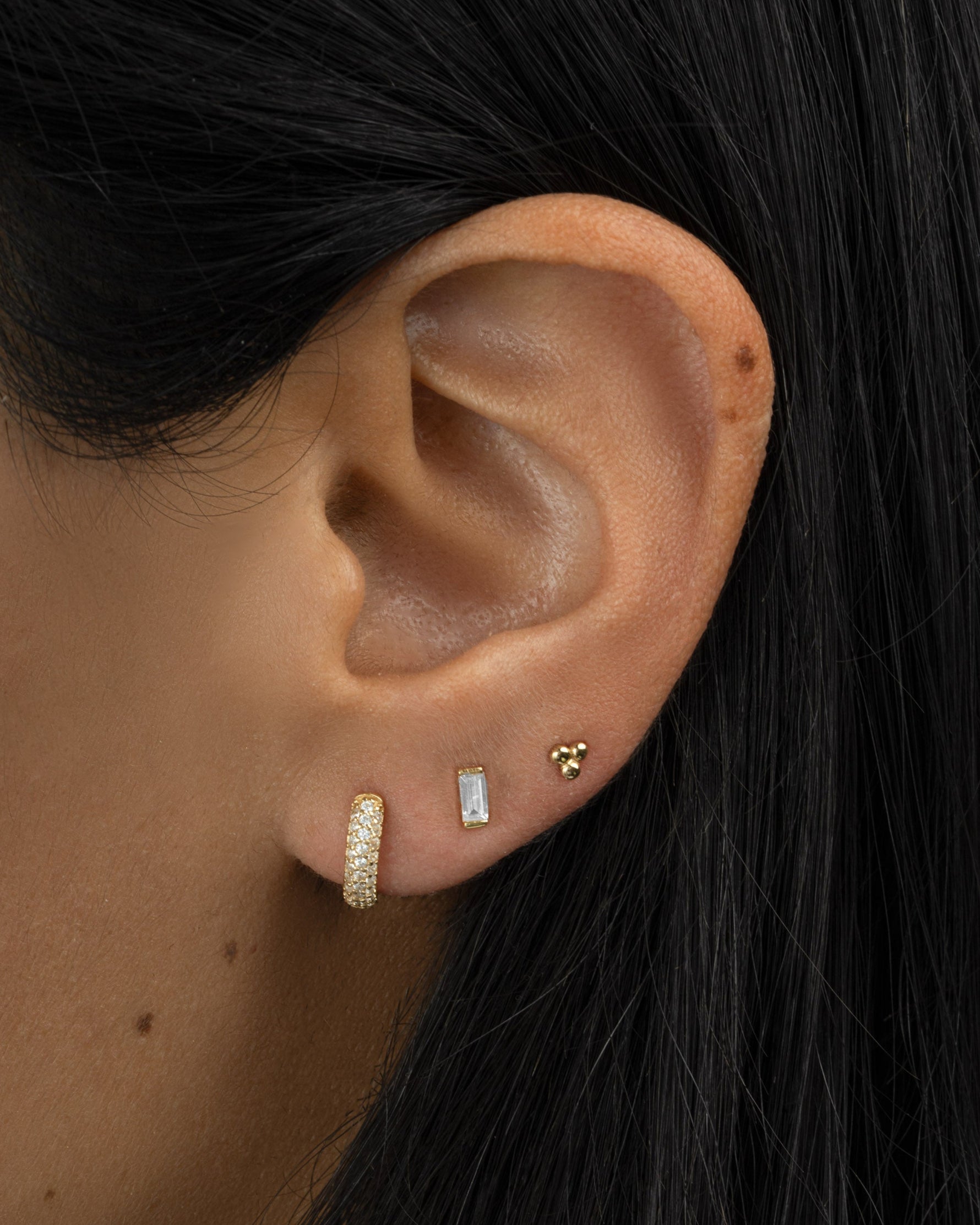 Gold 3-ball stud earrings by Sami Jewels featuring minimalist design and shiny spherical studs for everyday wear.
