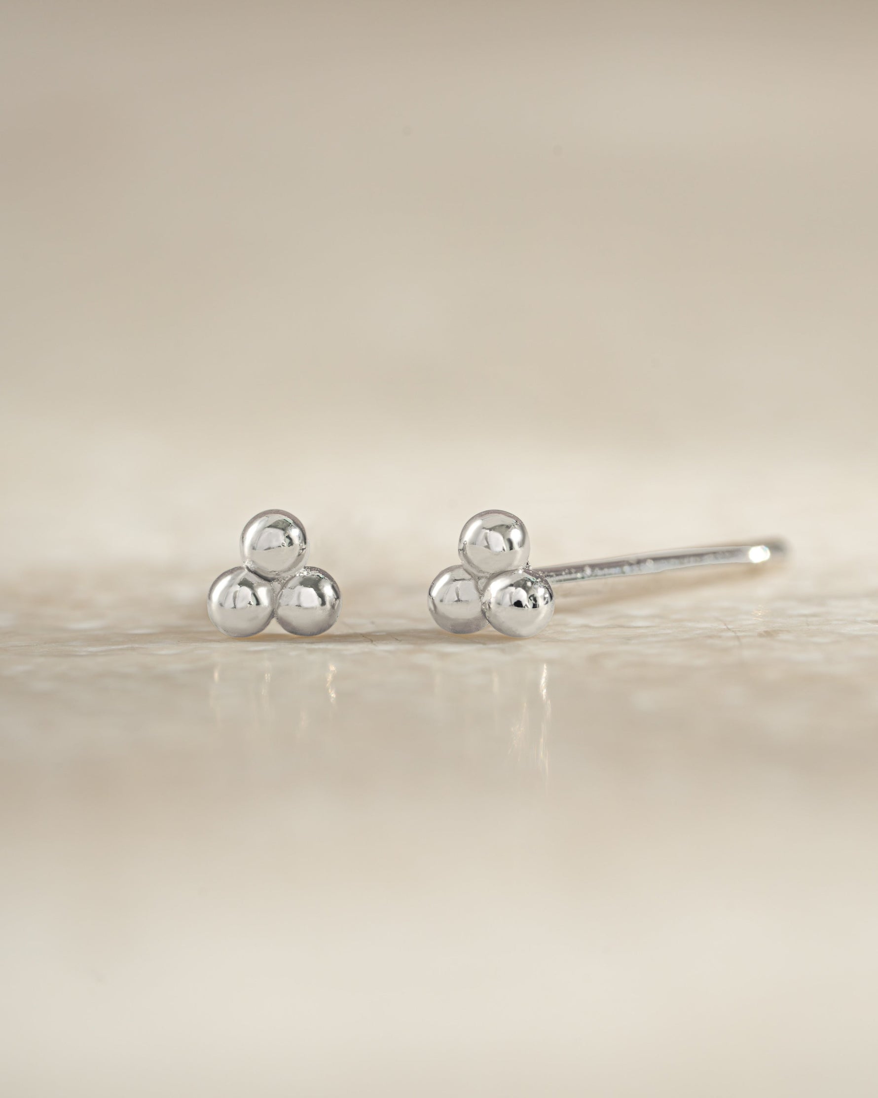 Sterling silver 3-ball stud earrings by Sami Jewels, front view showing minimalist round ball design.