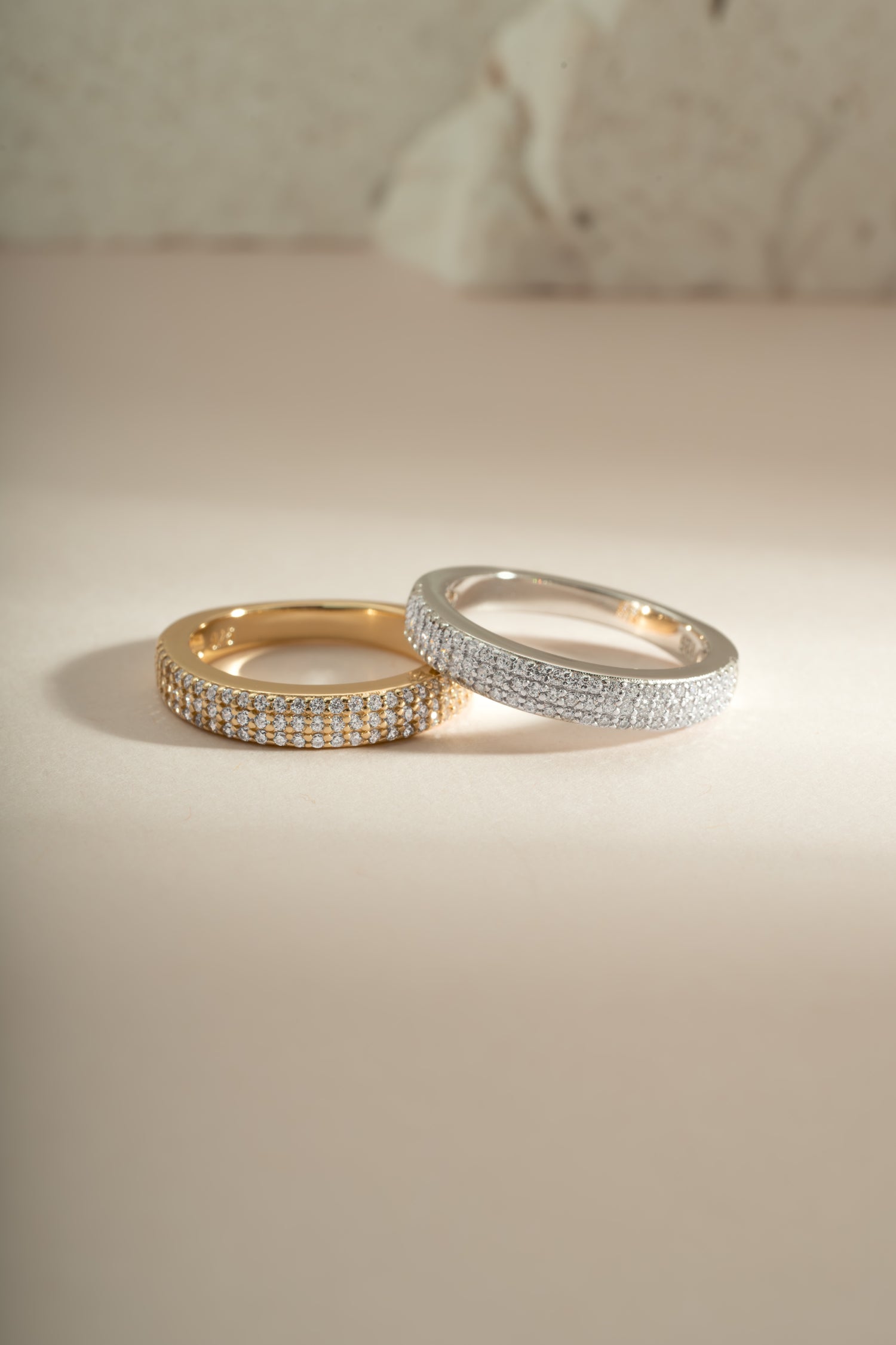 Sami Jewels 3-row diamond ring featuring sterling silver and gold accents, showcasing a layered and sparkling design.