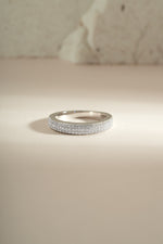 Sterling silver 3-row diamond ring by Sami Jewels featuring multiple sparkling diamond-studded bands.