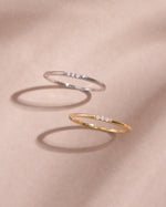 3 stone cubic zirconia stacking ring in sterling silver and gold top view 