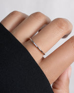 3 stone cubic zirconia stacking ring in sterling silver on model